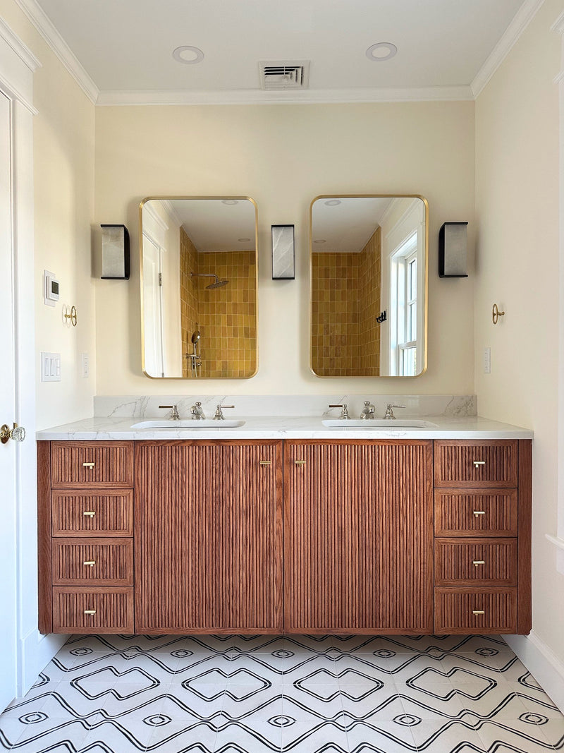 Reeded tambour wood panels installed as a feature wall in a contemporary living room